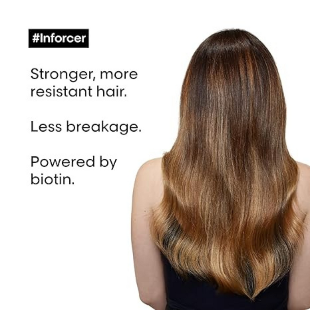 Flacon de l'Après-shampoing Inforcer Anti-Casse de L'Oréal Professionnel, soin capillaire pour cheveux fragiles.