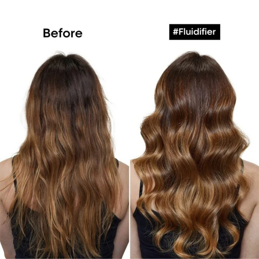 Flacon de la Crème 10-en-1 sans rinçage Blow-Dry Fluidifier de L'Oréal Professionnel, soin thermo-réactif pour un brushing durable.