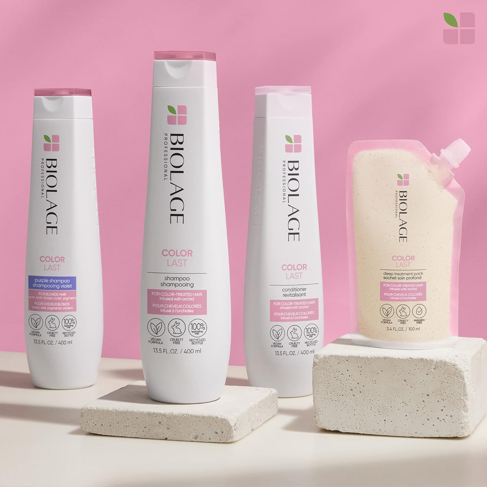 Masque Biolage ColorLast à l’abricot – pot ouvert montrant texture riche, soin profond pour cheveux colorés éclatants