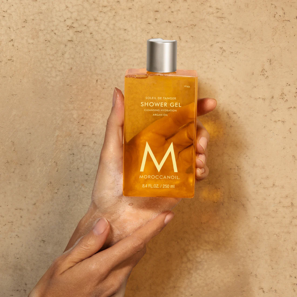 Flacon 250 ml Moroccanoil Shower Gel Soleil de Tanger, gel douche hydratant parfum clémentine, gingembre frais et fleur de bigaradier à l’huile d’argan.