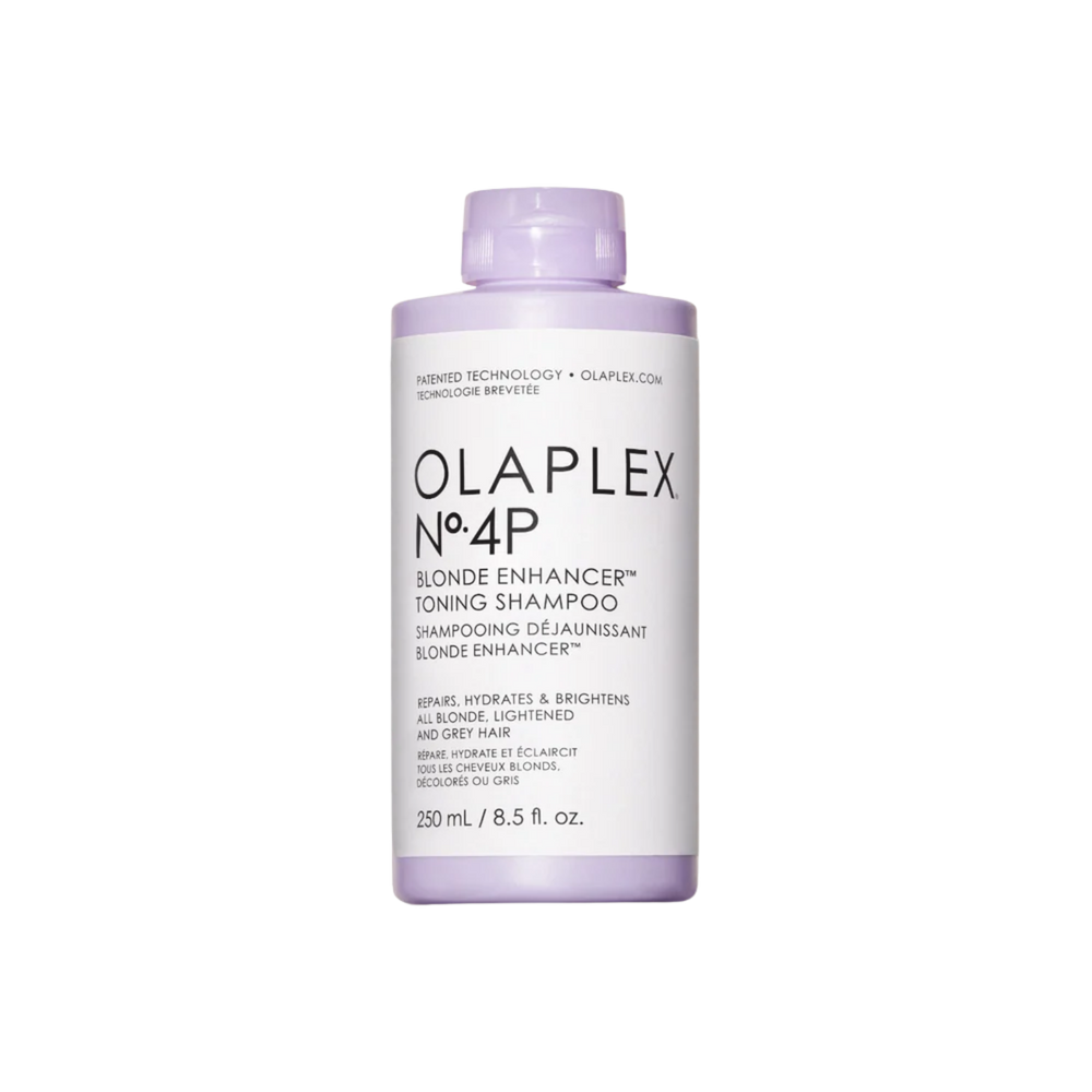 Flacon du shampooing Olaplex N° 4P Blonde Enhancer posé sur fond neutre