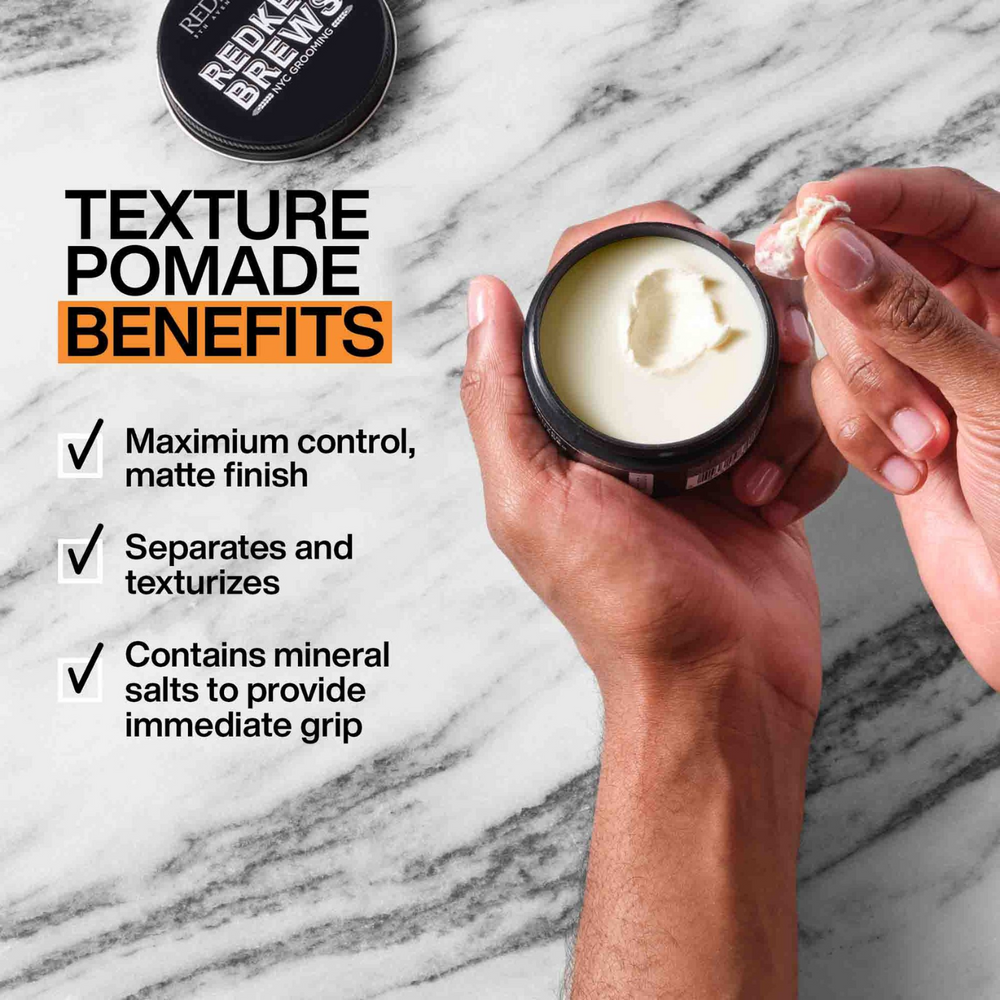 Pot de pommade texturisante Redken Brews Outplay, texture mate, fini naturel, coiffage texturé et adhésif.