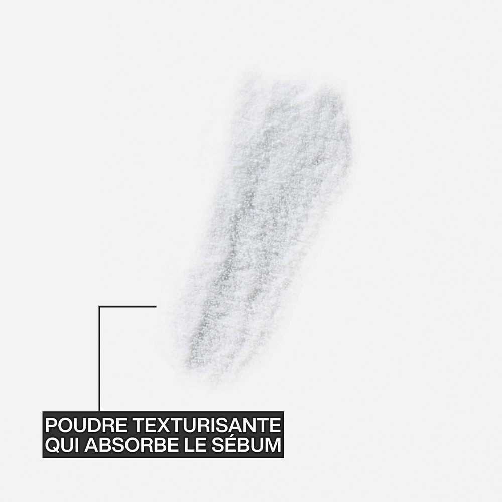 Poudre capillaire Redken Powder Grip 03 posée sur fond clair.