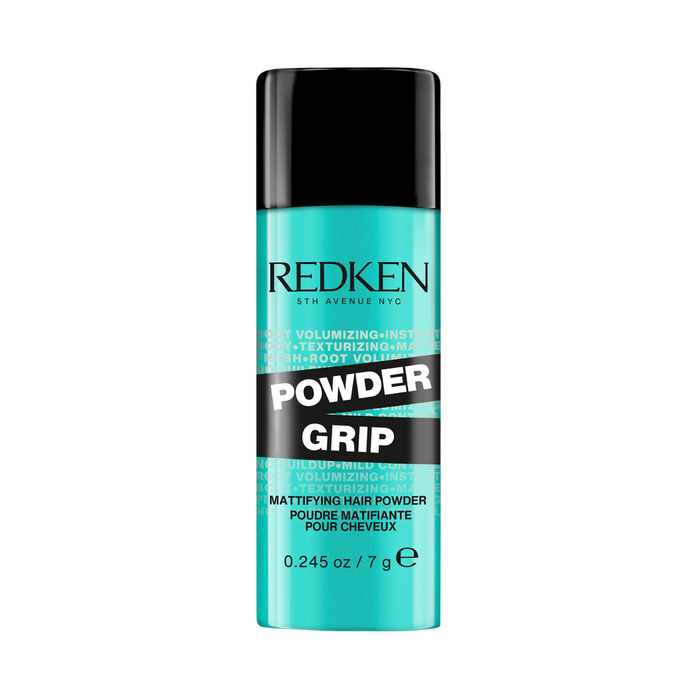 Poudre capillaire Redken Powder Grip 03 posée sur fond clair.