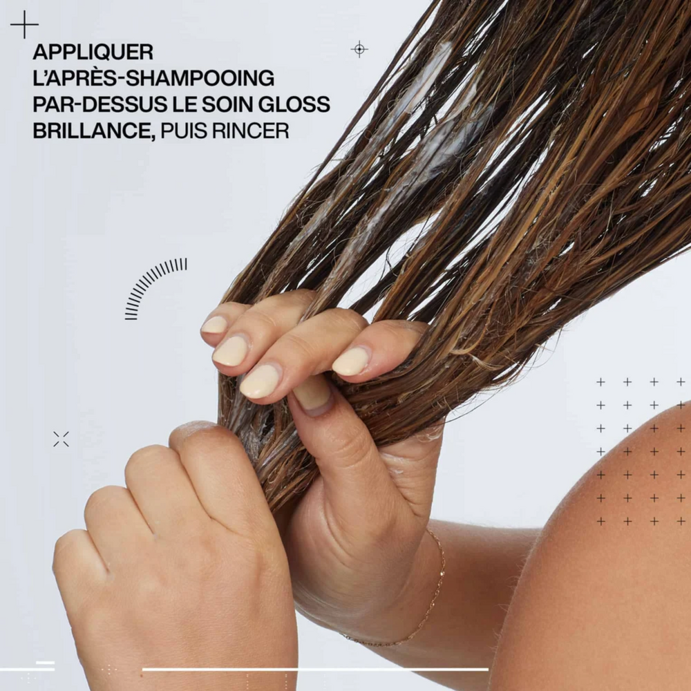Flacon de l’après-shampooing Redken Acidic Color Gloss sur fond neutre, soin professionnel pour cheveux colorés
