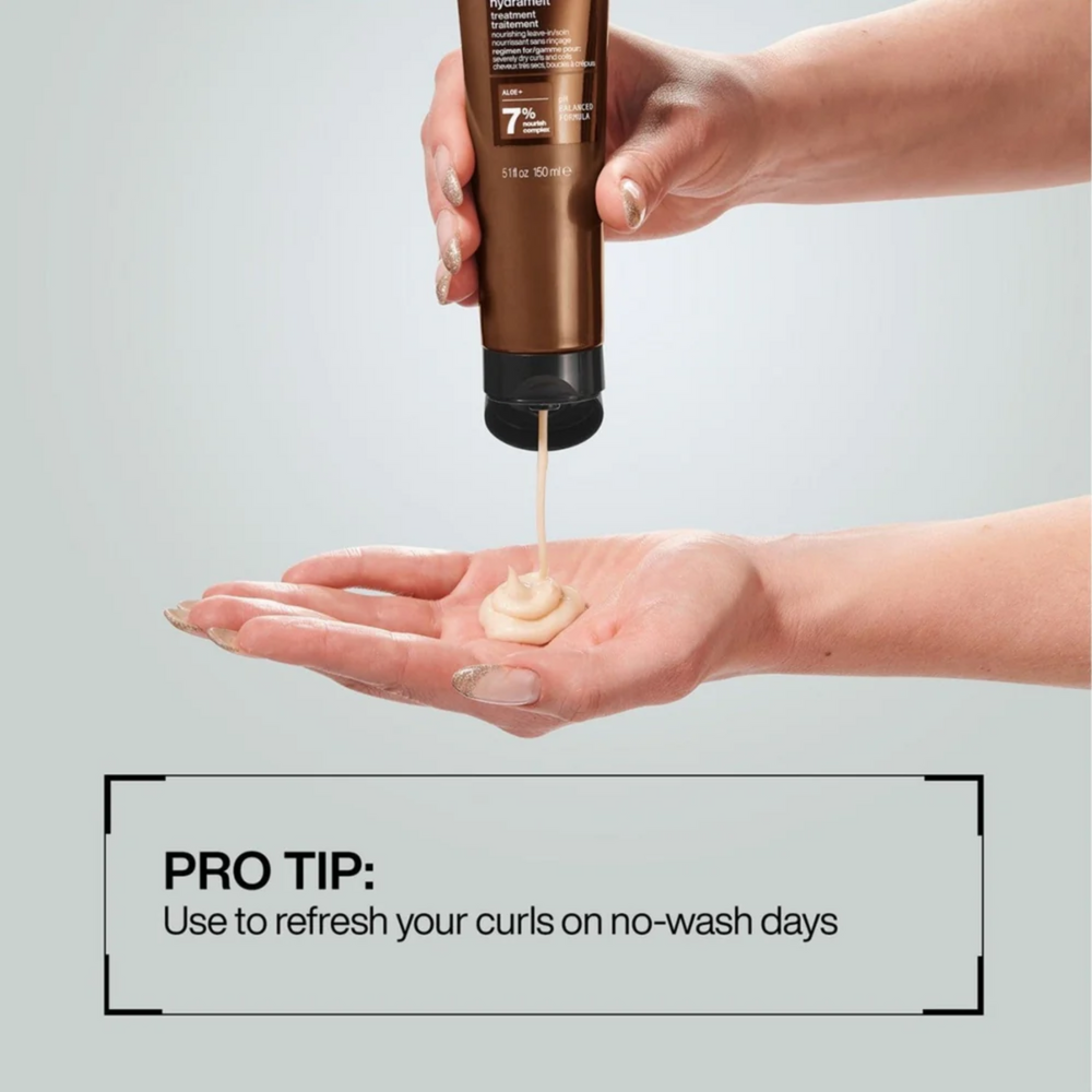 Flacon de Redken All Soft Mega Hydramelt, soin sans rinçage hydratant pour cheveux secs et épais.