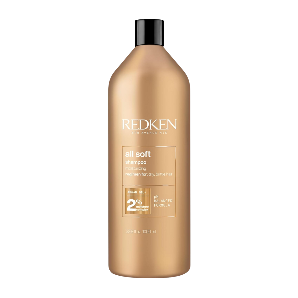 Flacon de Redken All Soft Shampoo, shampooing adoucissant à l’huile d’argan pour cheveux secs et abîmés.