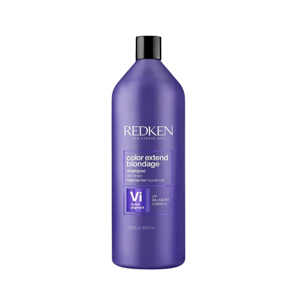 Flacon de shampooing Redken Blondage Purple avec pigments violets, neutralisant les reflets cuivrés pour cheveux blonds