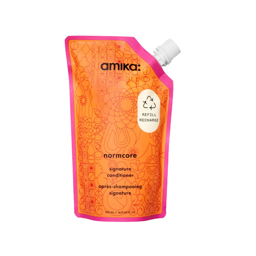 Flacon du revitalisant amika Normcore pour hydratation quotidienne et douceur