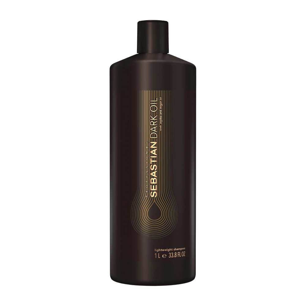Flacon 500 ml de Sebastian Dark Oil Lightweight Shampoo – nettoyant léger pour cheveux brillants et souples.