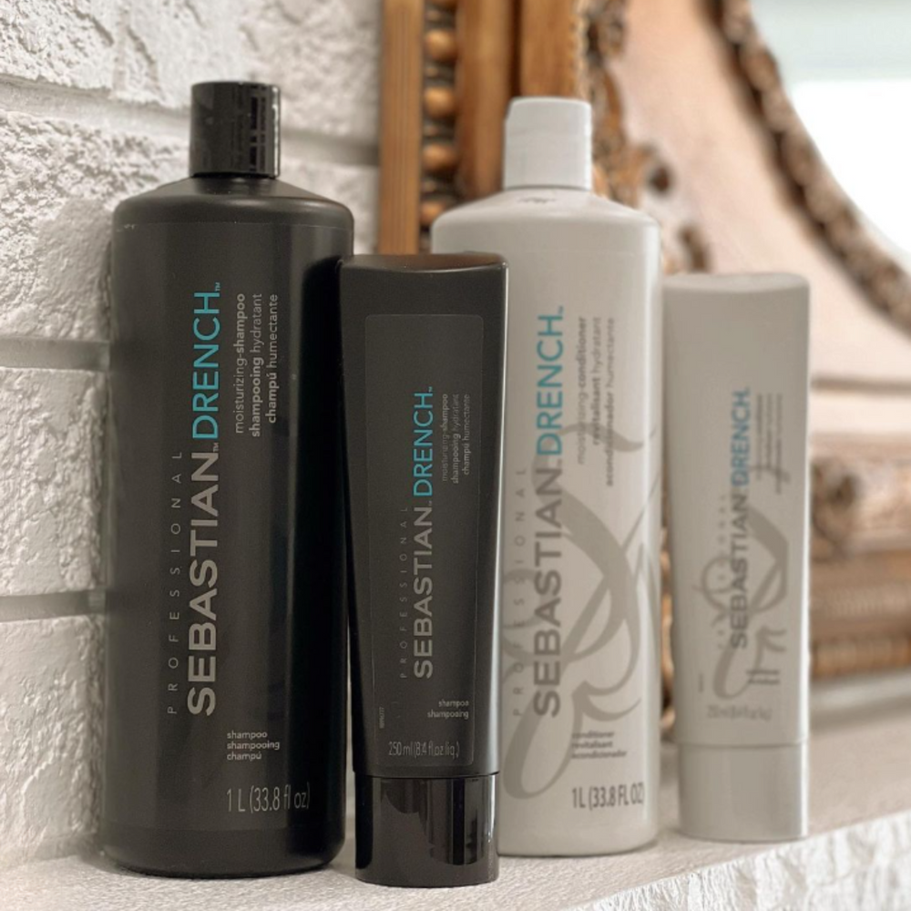 Flacon de Sebastian Drench Moisturizing Conditioner 250 ml, après-shampooing hydratant pour cheveux secs et frisés.