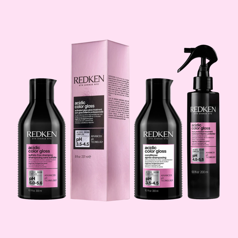Bouteille du traitement lustrant Redken Acidic Color Gloss, luxe professionnel et couleur protégée