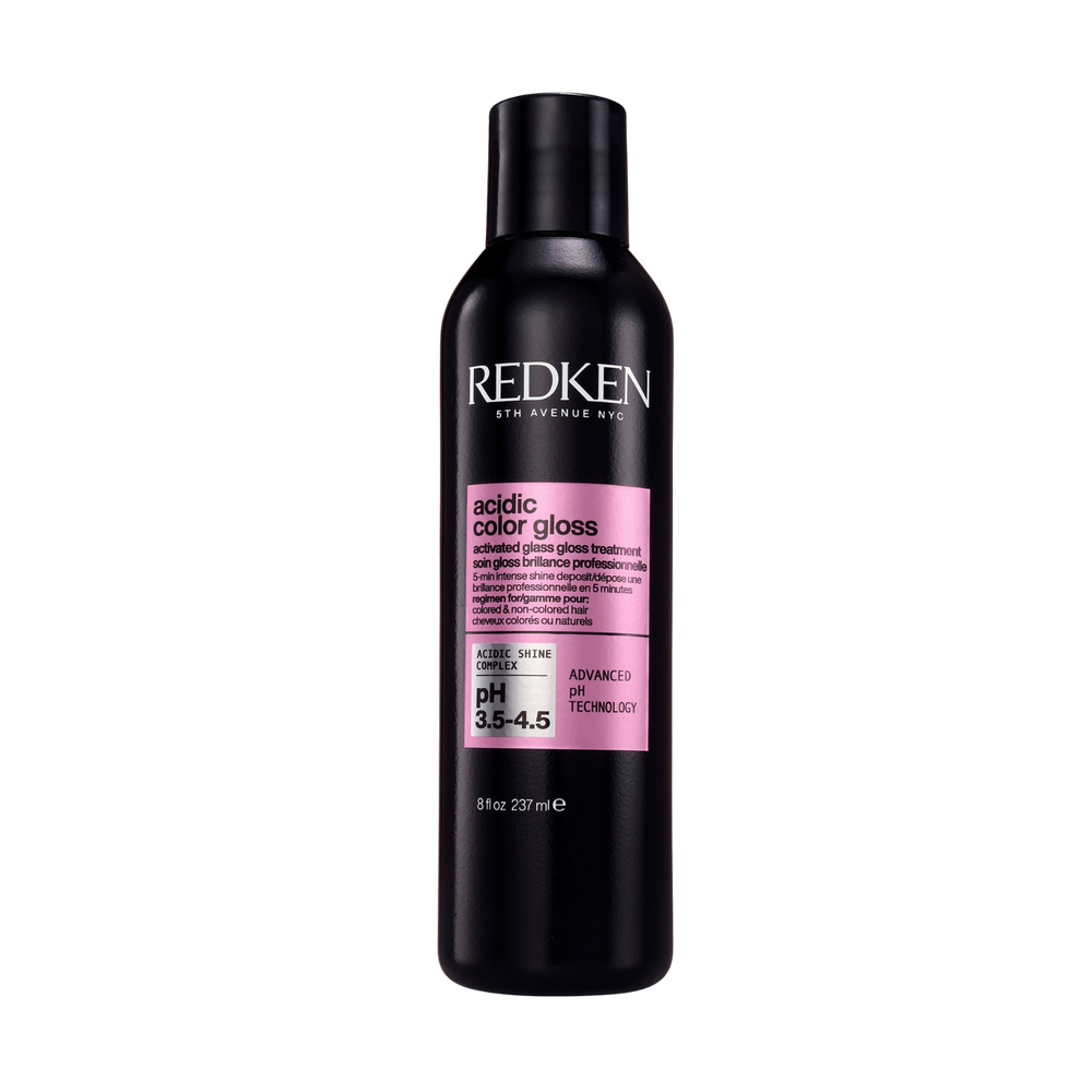 Bouteille du traitement lustrant Redken Acidic Color Gloss, luxe professionnel et couleur protégée