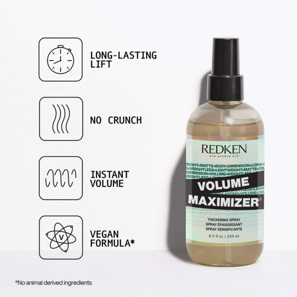 Flacon spray 250 ml du Volume Maximizer Redken posé sur fond neutre.