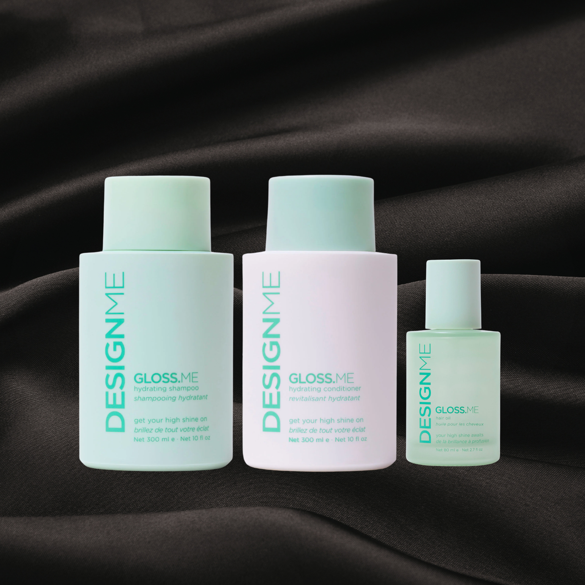 trio gloss me de la gamme design me sur un fond noir