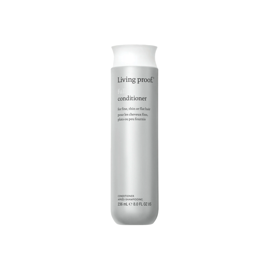 Flacon de Living Proof Full Conditioner posé sur fond neutre, avec des cheveux volumineux et brillants en arrière-plan

