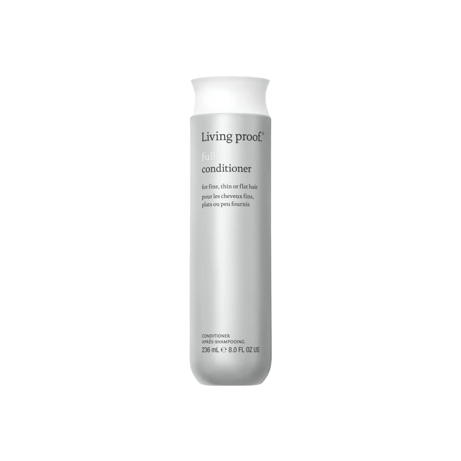 Flacon de Living Proof Full Conditioner posé sur fond neutre, avec des cheveux volumineux et brillants en arrière-plan

