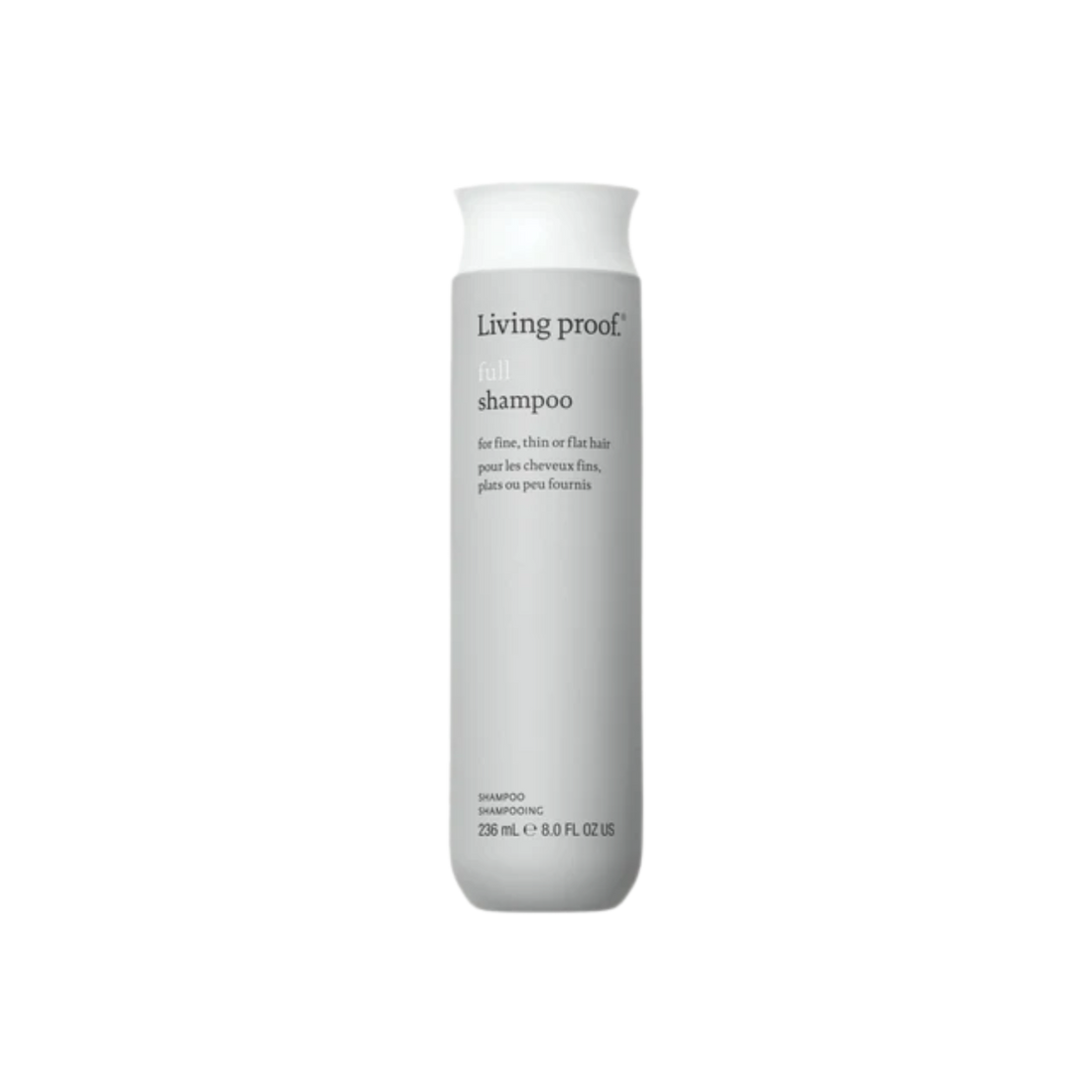Flacon du shampoing Full Living Proof, blanc et vert, posé sur fond neutre, évoquant volume, légèreté et soin capillaire professionnel.

