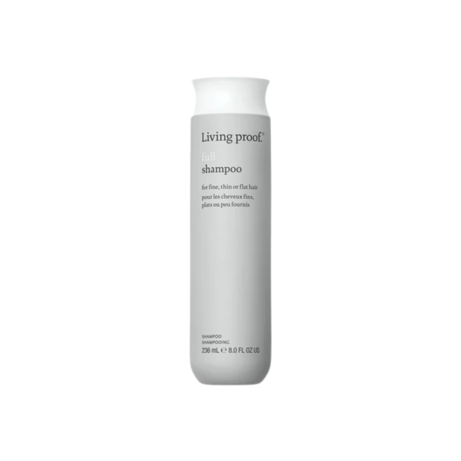 Flacon du shampoing Full Living Proof, blanc et vert, posé sur fond neutre, évoquant volume, légèreté et soin capillaire professionnel.

