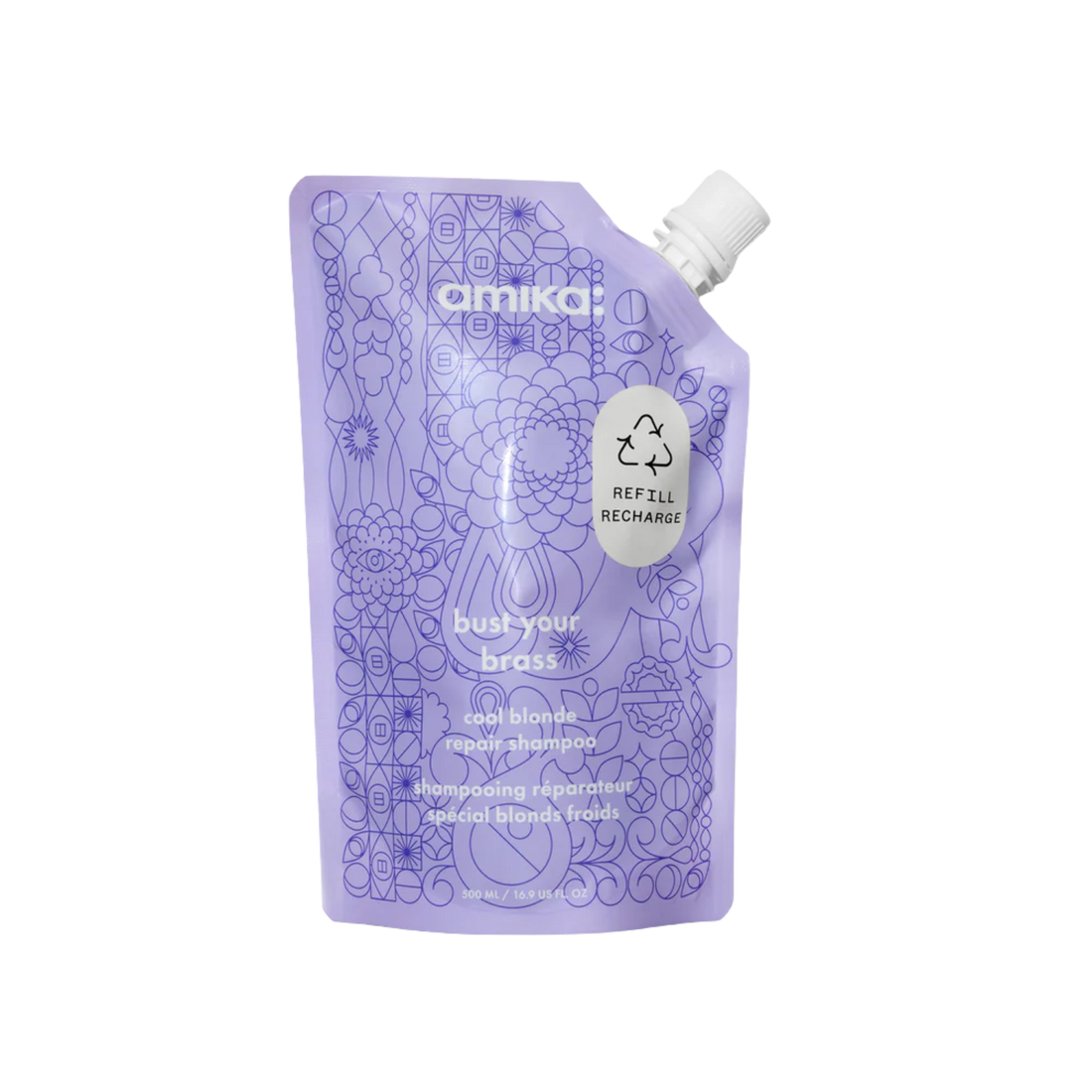 Flacon du shampoing Amika Bust Your Brass 275 ml posé sur fond blanc

