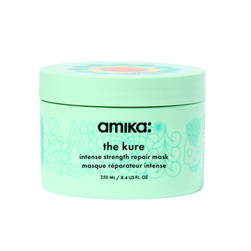 Flacon du masque réparateur intense The Kure d’Amika 500 ml posé sur fond blanc

