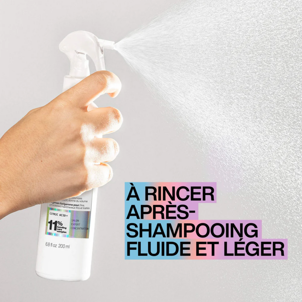 Flacon 200 ml de l’après-shampoing liquide léger Redken ABC sur fond blanc.