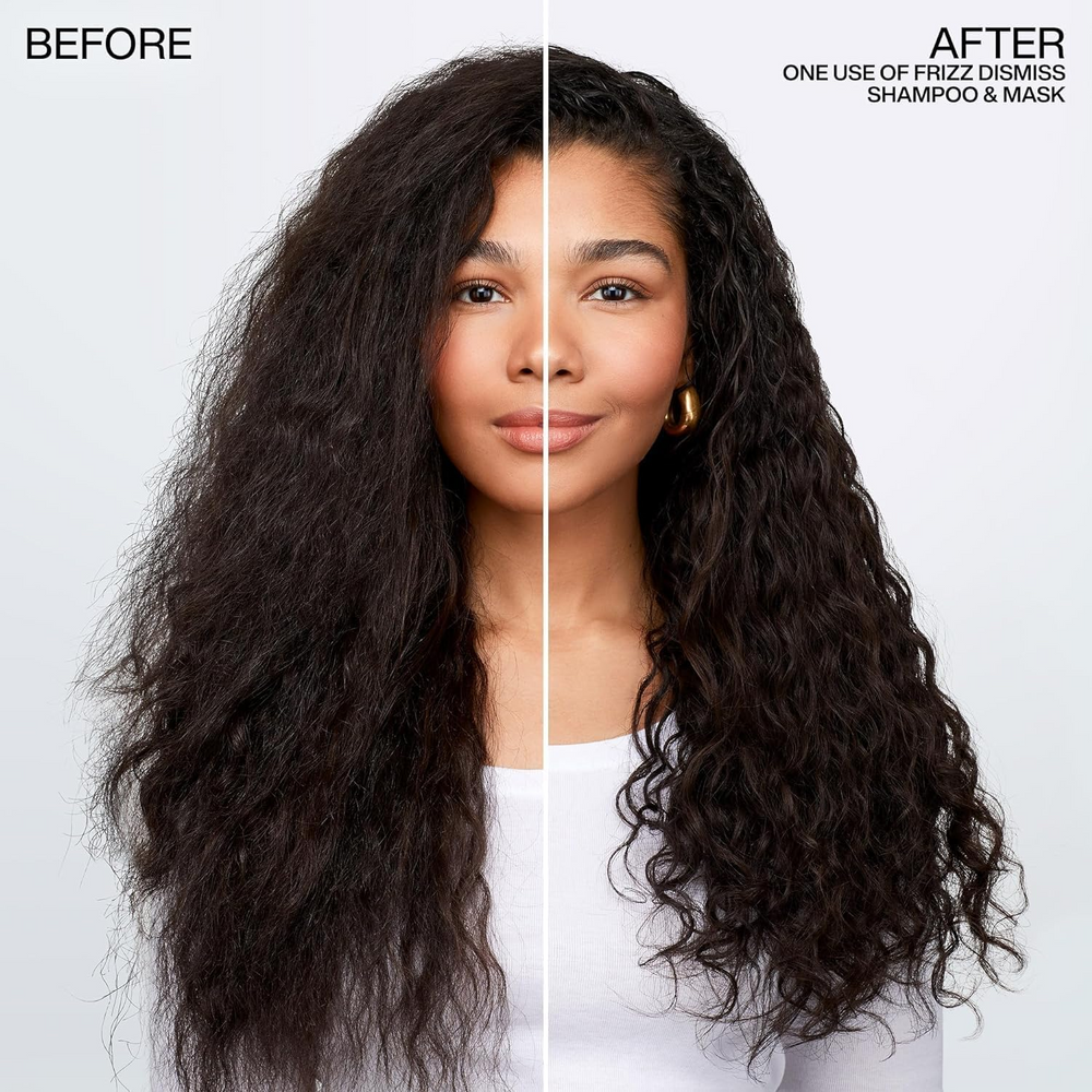 Flacon de l’après‑shampooing Redken Frizz Dismiss, formule sans sulfates, enrichie en huile de babassu, idéal anti‑frisottis.