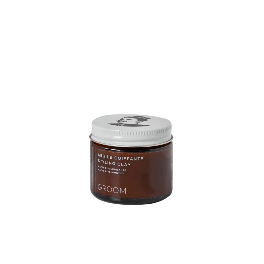 Pot de 60 ml d'Argile Coiffante Groom – soin coiffant naturel au fini mat, volume instantané, parfum agrumes-sauge

