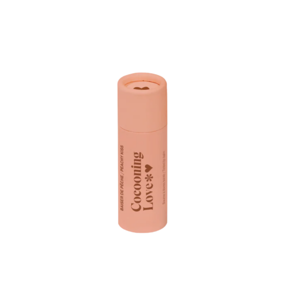 Tube en carton du baume à lèvres teinté Cocooning Love Peachy Kiss, nuance pêche doux.
