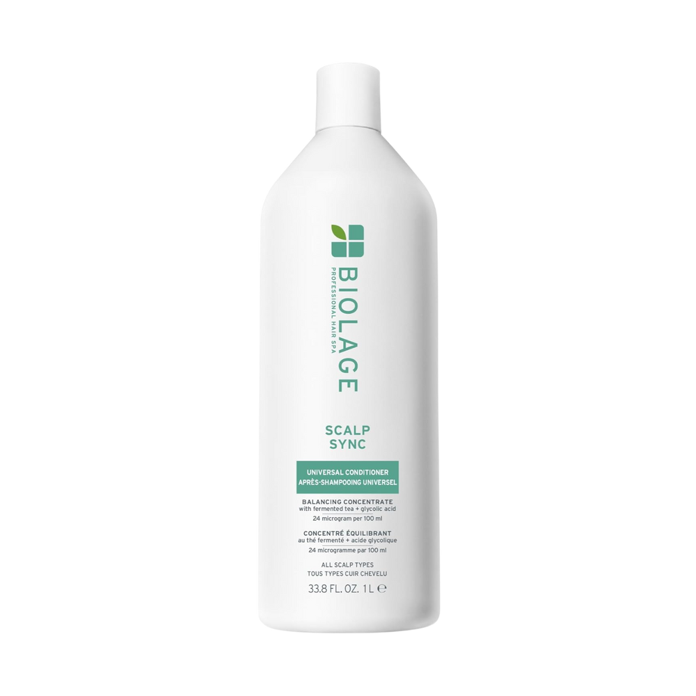 Flacon de 1000 ml du Biolage ScalpSync Universal Conditioner, enrichi en menthe poivrée, pour une hydratation légère et un démêlage efficace.