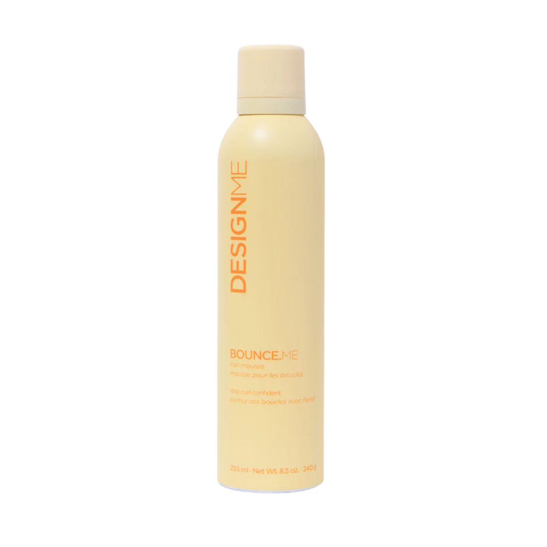 Flacon de mousse Bounce.Me pour boucles, texture légère et crémeuse, idéal pour définir boucles sans frisottis.
