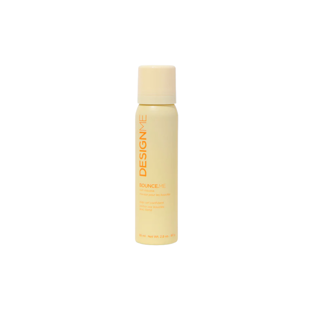 Flacon de mousse Bounce.Me pour boucles, texture légère et crémeuse, idéal pour définir boucles sans frisottis.

