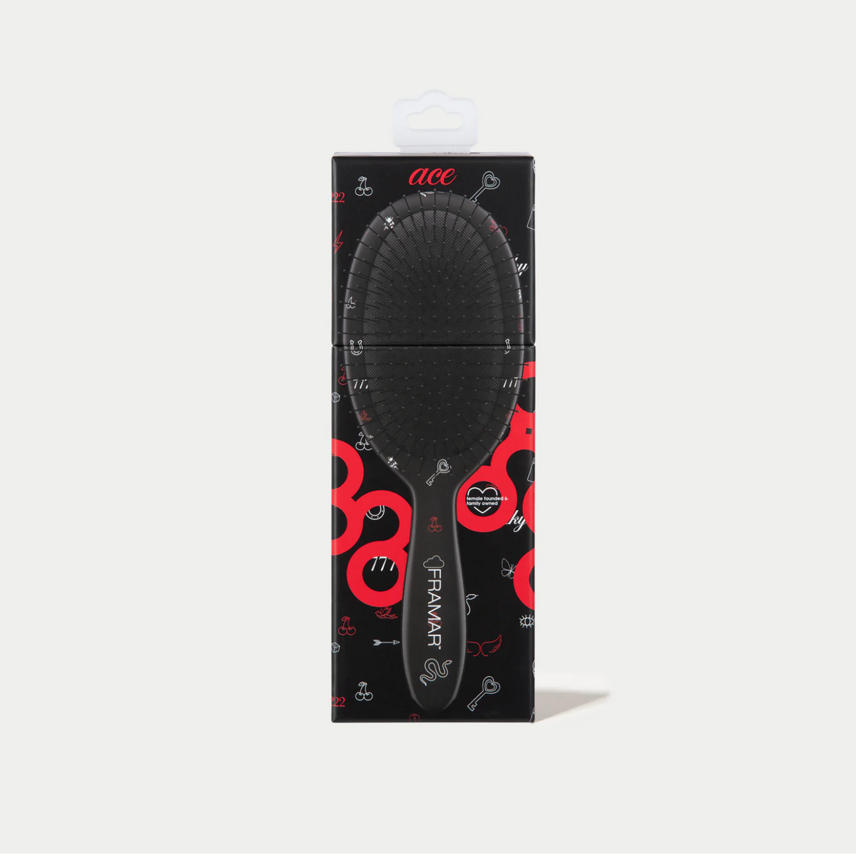 Brosse démêlante Framar Ace noir mat avec poils souples et design anti-casse.