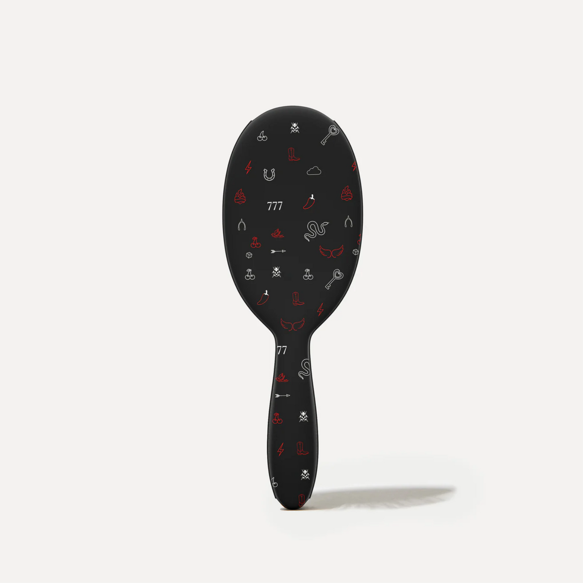 Brosse démêlante Framar Ace noir mat avec poils souples et design anti-casse.