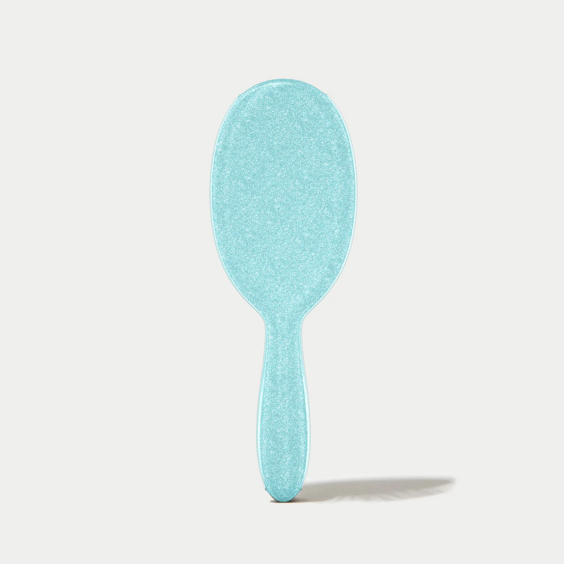 Brosse démêlante Framar Sprinkle avec manche confettis et poils souples à deux niveaux.
