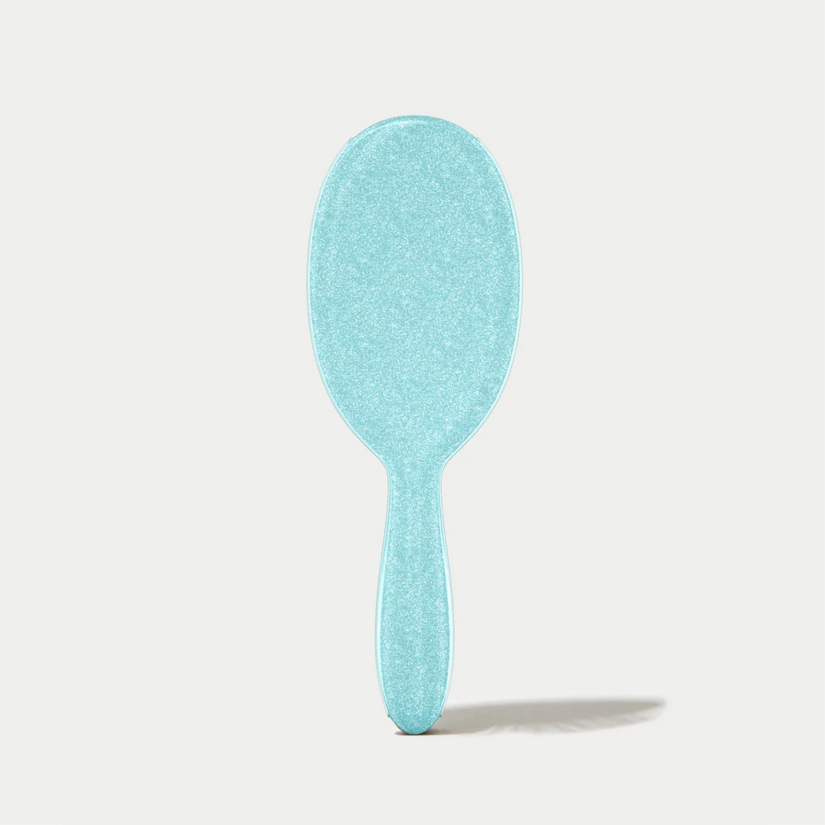 Brosse démêlante Framar Sprinkle avec manche confettis et poils souples à deux niveaux.