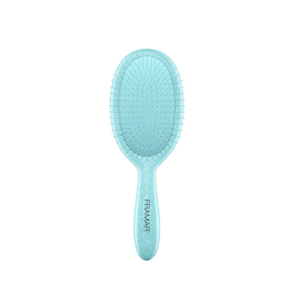Brosse démêlante Framar Sprinkle avec manche confettis et poils souples à deux niveaux.