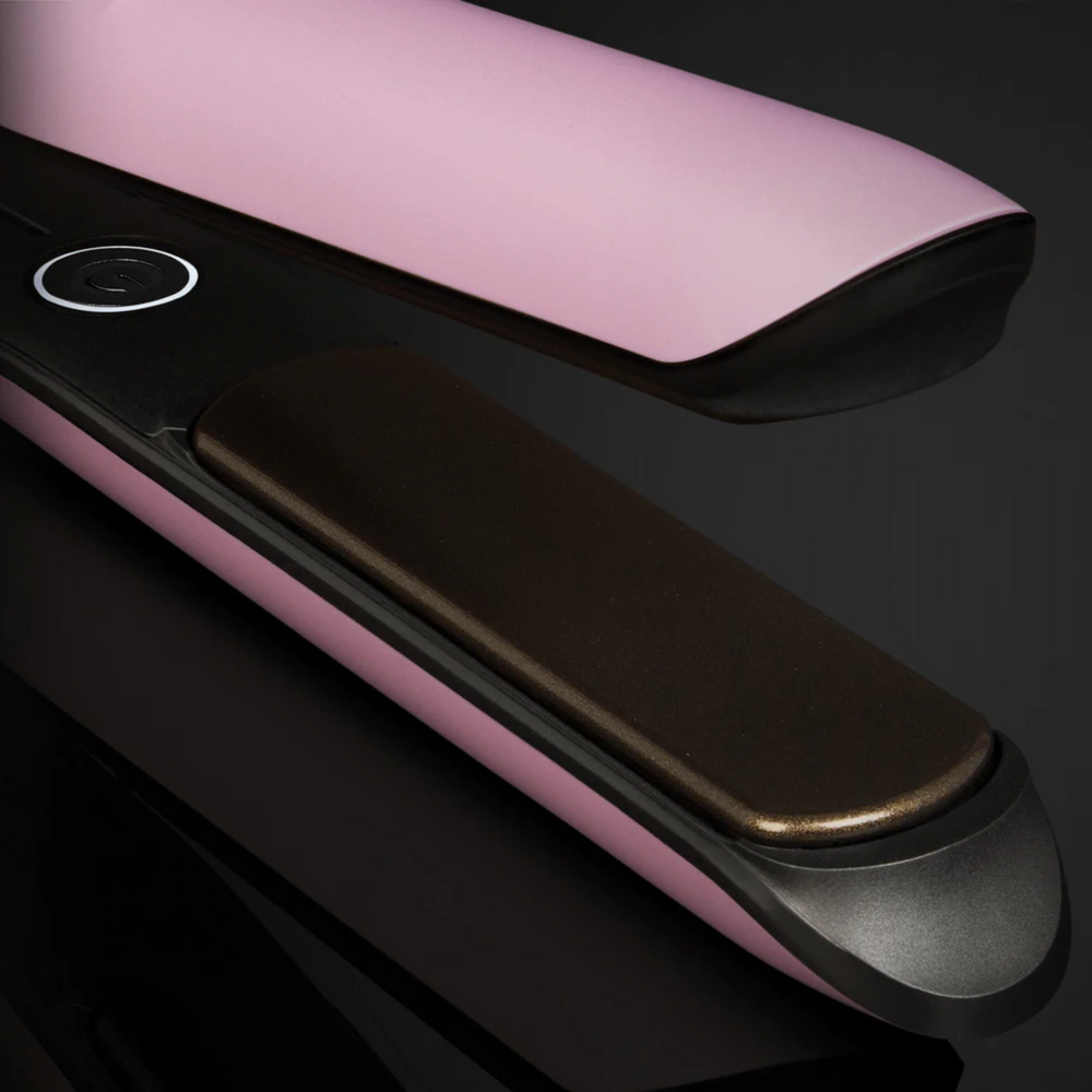 Fer plat GHD Chronos Pink Sorbet avec embout de silicone, pochette de transport et tapis chauffant – édition limitée.
