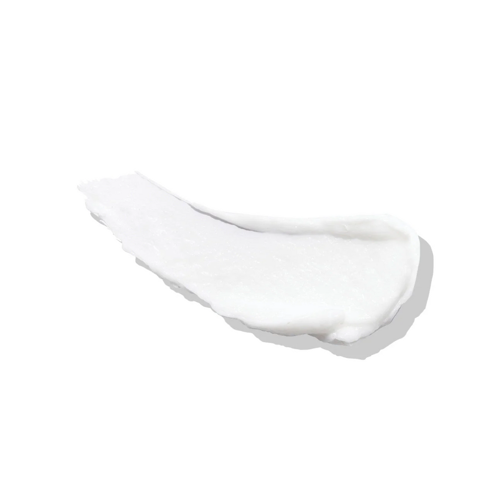 Pot de la crème Frizz Control Shaping Cream d’ELEVEN Australia sur fond neutre, texture crème lissante anti‑frisottis