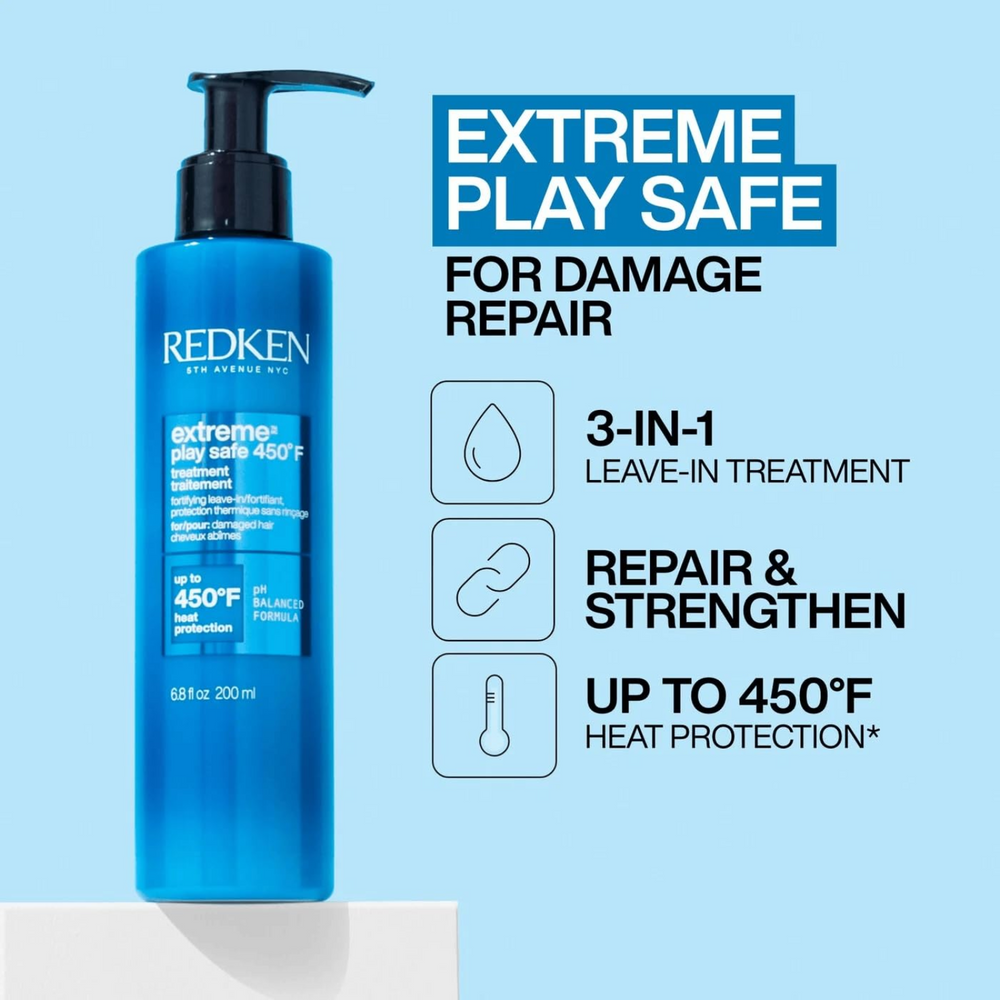 Flacon lotion Extreme Play Safe de Redken posé sur fond clair, protection contre la chaleur, enrichi en tourmaline et protéines végétales.