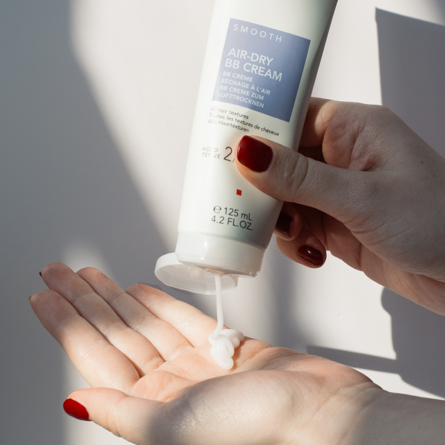 Goldwell StyleSign Smooth soin lissant cheveux anti-frisottis
