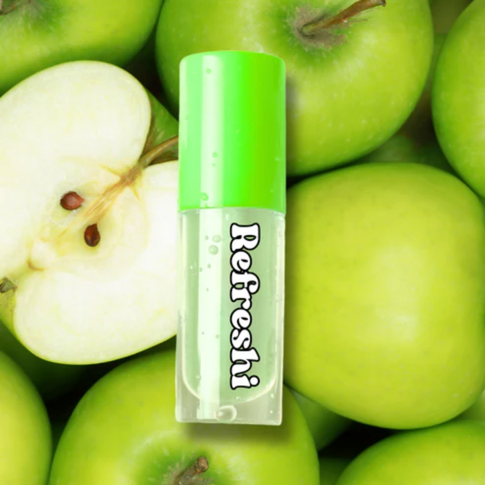 Tube 5 ml Green Apple Lip Oil Refreshi, texture brillante non collante, parfum pomme verte acidulée, bulles anti‑débordement, soin végan

