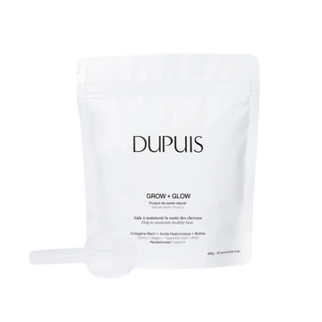 Poudre du supplément Grow & Glow saveur pamplemousse avec pot ouvert, arrière-plan neutre