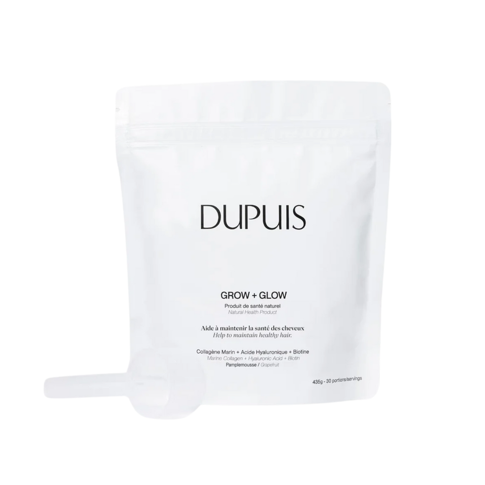 Poudre du supplément Grow & Glow saveur pamplemousse avec pot ouvert, arrière-plan neutre
