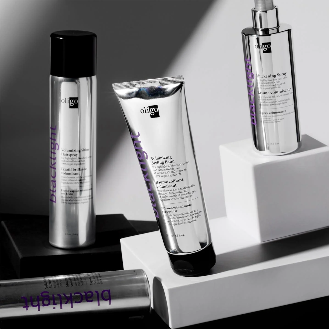 Flacon du spray épaississant Oligo Blacklight – spray volumisant professionnel