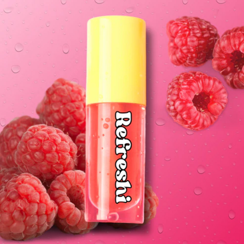 Tube d’huile à lèvres Framboise Rouge Refreshi sur fond rose vif, fini glossy fruité

