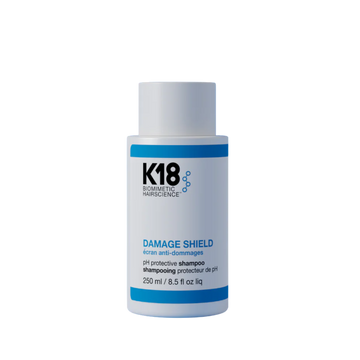 Flacon de shampooing K18 Damage Shield, soin protecteur et réparateur pour cheveux abîmés

