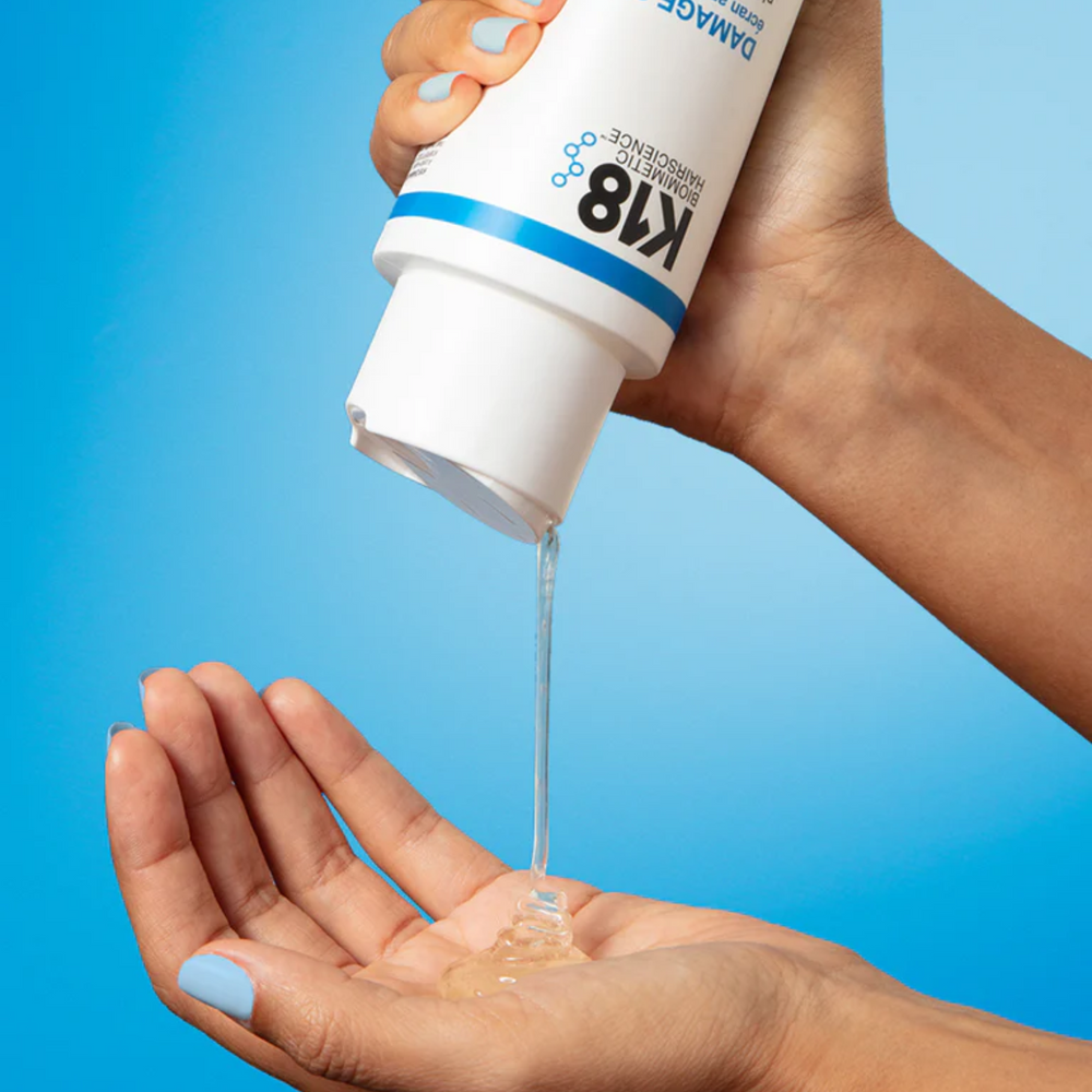 Flacon de shampooing K18 Damage Shield, soin protecteur et réparateur pour cheveux abîmés

