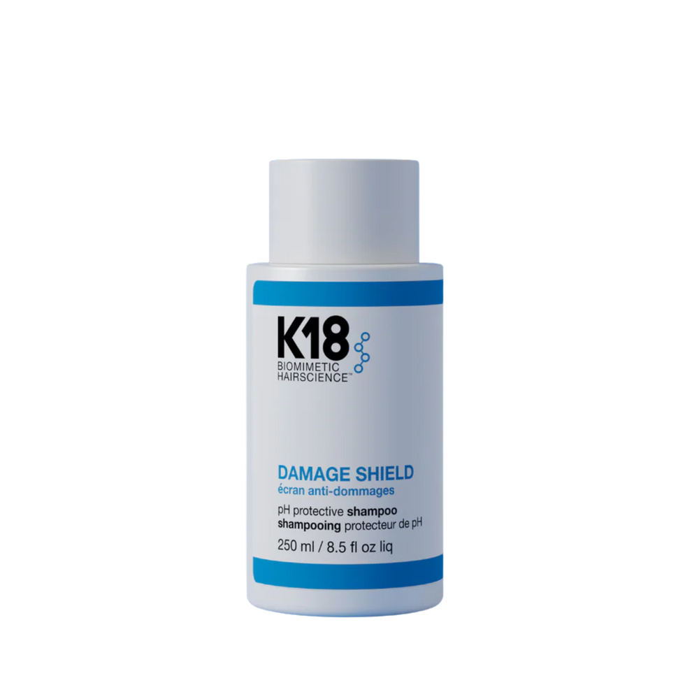 Flacon de shampooing K18 Damage Shield, soin protecteur et réparateur pour cheveux abîmés

