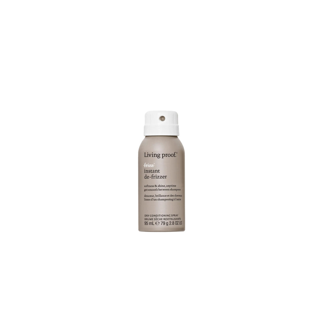 Flacon beige du spray No Frizz Instant De‑Frizzer posé sur une surface neutre, illustrant un soin express pour lisser les frisottis et raviver la brillance.

